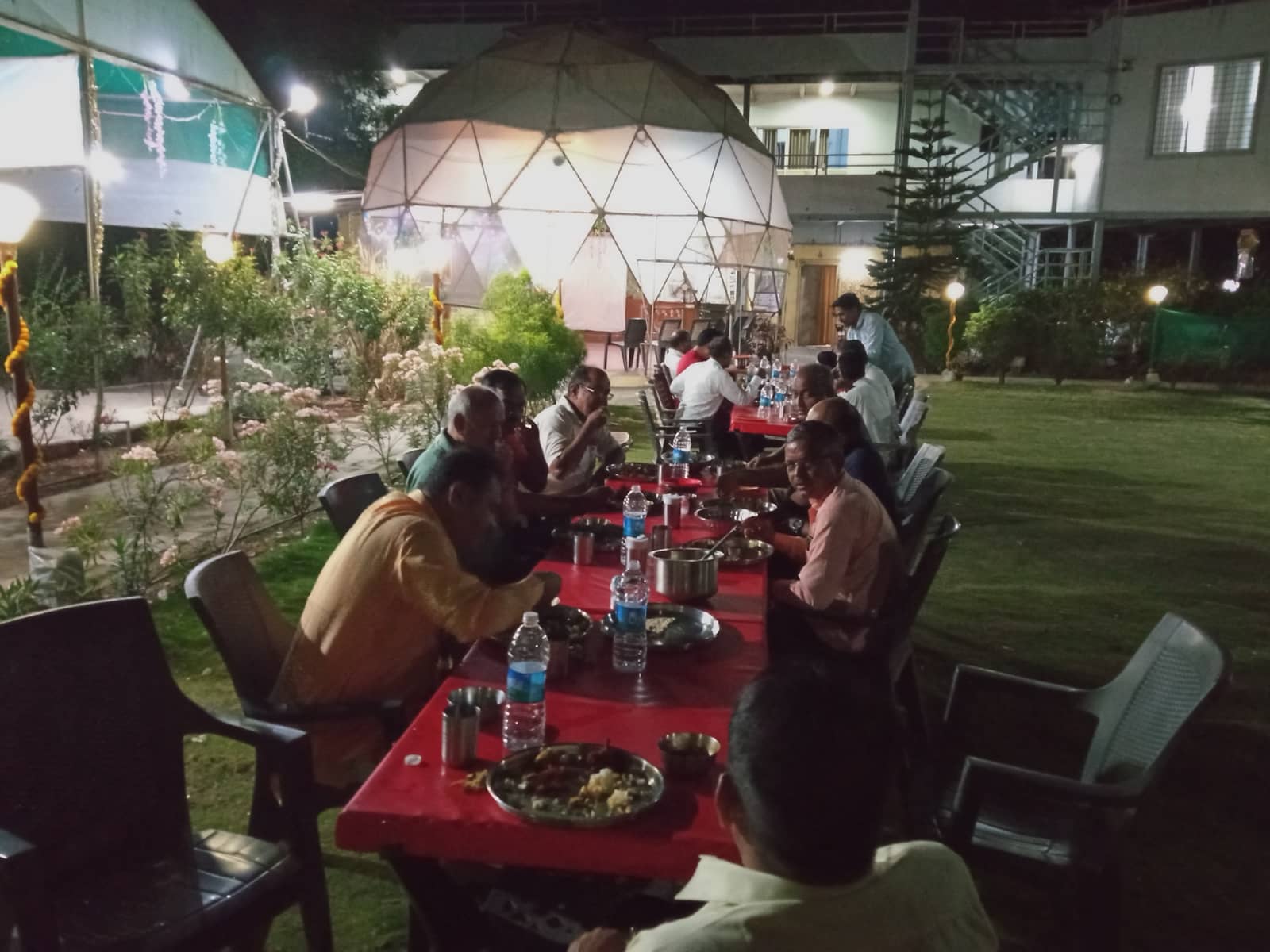 Recreation on the lawn at Srushti Farm House