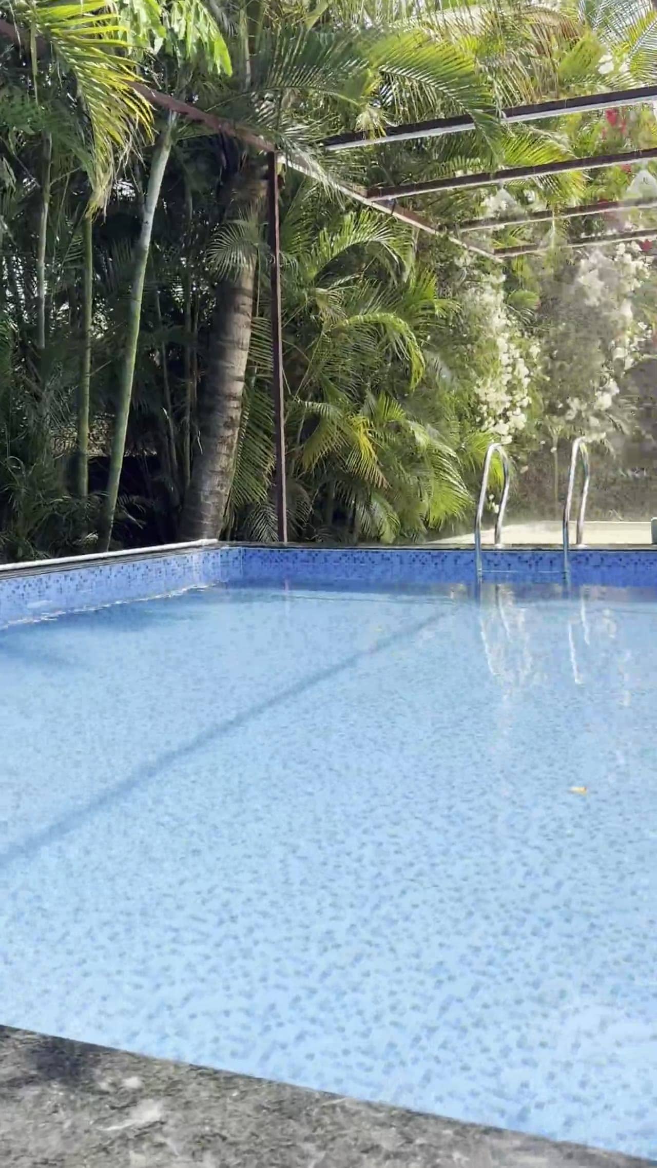 Pool area video at Srushti Farm House Pune